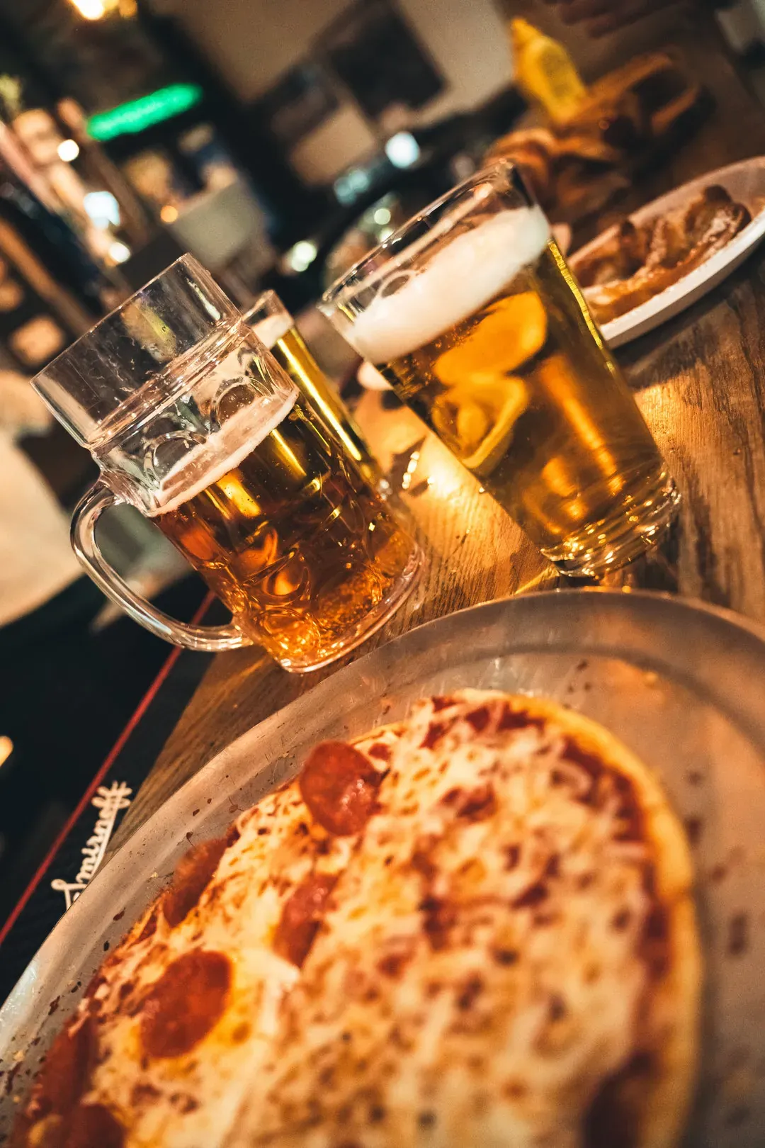 Friends cheering with beers