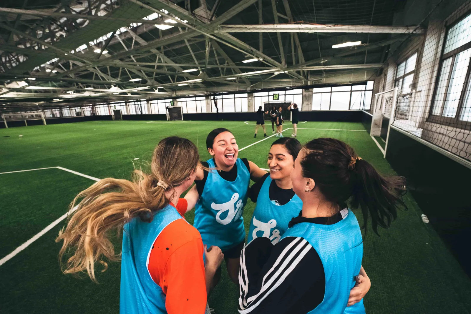 A united soccer team celebrating